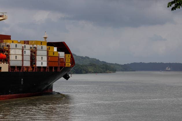 Panama Canal cuts daily transit slots amid reduced rainfall PANAMA CITY, PANAMA - AUGUST 22: A cargo vessel transits through the Panama Canal in Panama City, Panama, on August 22, 2026. The Panama Canal Authority announced temporary reductions in daily transit capacity at both the Neopanamax and Panamax locks due to below-expected rainfall in the canal watershed. Effective September 3, the number of daily slots at the Neopanamax Locks will be reduced to nine, while Panamax Locks will have 25 daily slots, falling to 23 from September 15. The authority said the measures aim to preserve service reliability and safeguard water resources for human consumption amid reduced precipitation despite the arrival of the rainy season and water-saving mea  Copyright: x2026xAnadoluxDanielxGonzalezx
