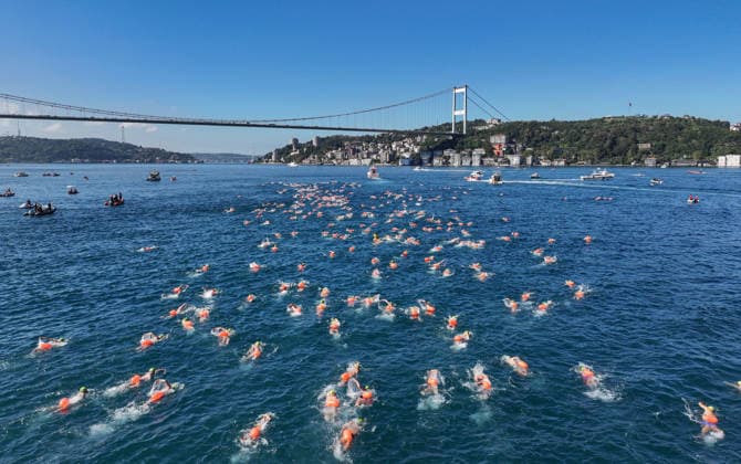 38th Bosphorus Cross-Continental Swimming Race ISTANBUL, TURKIYE - AUGUST 23: An aerial view of swimmers competing in the 38th Bosphorus Cross-Continental Swimming Race in Istanbul, Turkiye, on August 23, 2026. Organized by the Turkish National Olympic Committee (TMOK), the race starts from Kanlica Pier on the Asian side and finishes in Kurucesme on the European side. Saffet Azak Anadolu Istanbul Turkey. Editorial use only. Please get in touch for any other usage.  Copyright: x2026xAnadoluxSaffetxAzakx