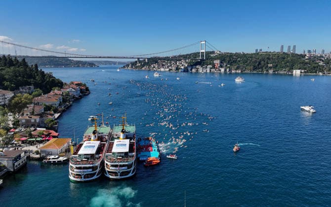 38th Bosphorus Cross-Continental Swimming Race ISTANBUL, TURKIYE - AUGUST 23: An aerial view of swimmers competing in the 38th Bosphorus Cross-Continental Swimming Race in Istanbul, Turkiye, on August 23, 2026. Organized by the Turkish National Olympic Committee (TMOK), the race starts from Kanlica Pier on the Asian side and finishes in Kurucesme on the European side. Saffet Azak Anadolu Istanbul Turkey. Editorial use only. Please get in touch for any other usage.  Copyright: x2026xAnadoluxSaffetxAzakx