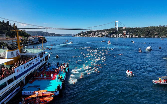 38th Bosphorus Cross-Continental Swimming Race ISTANBUL, TURKIYE - AUGUST 23: A view of swimmers competing in the 38th Bosphorus Cross-Continental Swimming Race in Istanbul, Turkiye, on August 23, 2026. Organized by the Turkish National Olympic Committee (TMOK), the race starts from Kanlica Pier on the Asian side and finishes in Kurucesme on the European side. Saffet Azak Anadolu Istanbul Turkey. Editorial use only. Please get in touch for any other usage.  Copyright: x2026xAnadoluxSaffetxAzakx