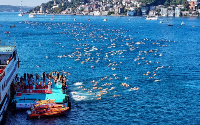 38th Bosphorus Cross-Continental Swimming Race ISTANBUL, TURKIYE - AUGUST 23: A view of swimmers competing in the 38th Bosphorus Cross-Continental Swimming Race in Istanbul, Turkiye, on August 23, 2026. Organized by the Turkish National Olympic Committee (TMOK), the race starts from Kanlica Pier on the Asian side and finishes in Kurucesme on the European side. Saffet Azak Anadolu Istanbul Turkey. Editorial use only. Please get in touch for any other usage.  Copyright: x2026xAnadoluxSaffetxAzakx
