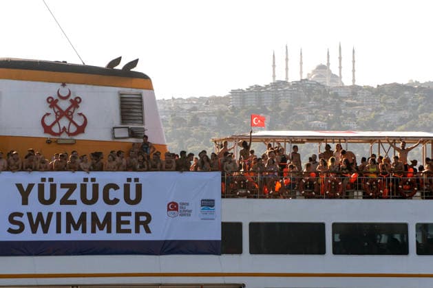 August 23, 2026, Istanbul, Turkey: Swimmers travel to the start line as they take part in the 38th Bosphorus Cross-Continental Swimming Race, crossing from the Asian side to the European side of the Istanbul, Turkey. Istanbul Turkey  - ZUMAz174 20260823_zip_z174_002 Copyright: xMoexZoyarix