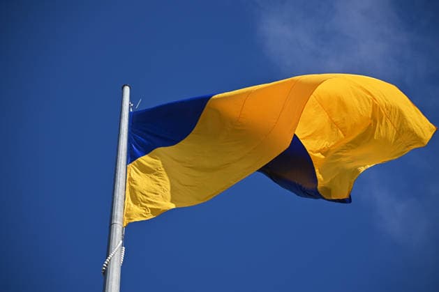 National Flag Day of Ukraine in Lviv LVIV, UKRAINE - AUGUST 23: Celebration of the National Flag Day of Ukraine during the Russian-Ukrainian War in Lviv, Ukraine on August 23, 2026. Due to the war, only the ceremonial raising of the Ukrainian flag on the highest flagpole in the city with the participation of soldiers from various branches of the armed forces took place. People also honored the fallen with a minute of silence, sang the Ukrainian anthem, and a military orchestra played several patriotic and folk songs. Michael Sorrow Anadolu Lviv Ukraine. Editorial use only. Please get in touch for any other usage.  Copyright: x2026xAnadoluxMichaelxSorrowx