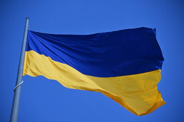 National Flag Day of Ukraine in Lviv LVIV, UKRAINE - AUGUST 23: Celebration of the National Flag Day of Ukraine during the Russian-Ukrainian War in Lviv, Ukraine on August 23, 2026. Due to the war, only the ceremonial raising of the Ukrainian flag on the highest flagpole in the city with the participation of soldiers from various branches of the armed forces took place. People also honored the fallen with a minute of silence, sang the Ukrainian anthem, and a military orchestra played several patriotic and folk songs. Michael Sorrow Anadolu Lviv Ukraine. Editorial use only. Please get in touch for any other usage.  Copyright: x2026xAnadoluxMichaelxSorrowx