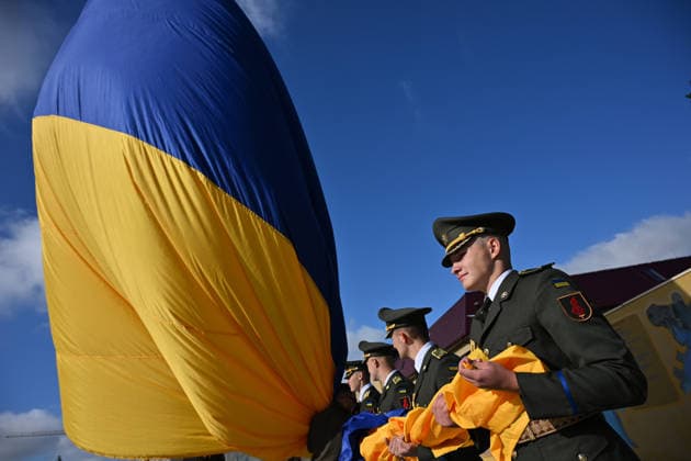 National Flag Day of Ukraine in Lviv LVIV, UKRAINE - AUGUST 23: Celebration of the National Flag Day of Ukraine during the Russian-Ukrainian War in Lviv, Ukraine on August 23, 2026. Due to the war, only the ceremonial raising of the Ukrainian flag on the highest flagpole in the city with the participation of soldiers from various branches of the armed forces took place. People also honored the fallen with a minute of silence, sang the Ukrainian anthem, and a military orchestra played several patriotic and folk songs. Michael Sorrow Anadolu Lviv Ukraine. Editorial use only. Please get in touch for any other usage.  Copyright: x2026xAnadoluxMichaelxSorrowx