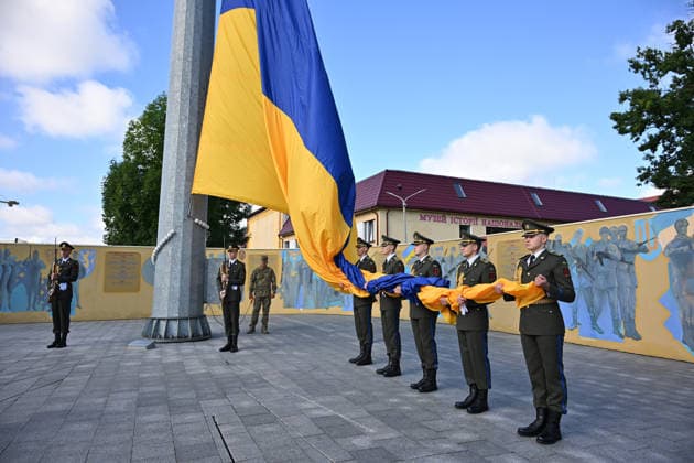 National Flag Day of Ukraine in Lviv LVIV, UKRAINE - AUGUST 23: Celebration of the National Flag Day of Ukraine during the Russian-Ukrainian War in Lviv, Ukraine on August 23, 2026. Due to the war, only the ceremonial raising of the Ukrainian flag on the highest flagpole in the city with the participation of soldiers from various branches of the armed forces took place. People also honored the fallen with a minute of silence, sang the Ukrainian anthem, and a military orchestra played several patriotic and folk songs. Michael Sorrow Anadolu Lviv Ukraine. Editorial use only. Please get in touch for any other usage.  Copyright: x2026xAnadoluxMichaelxSorrowx