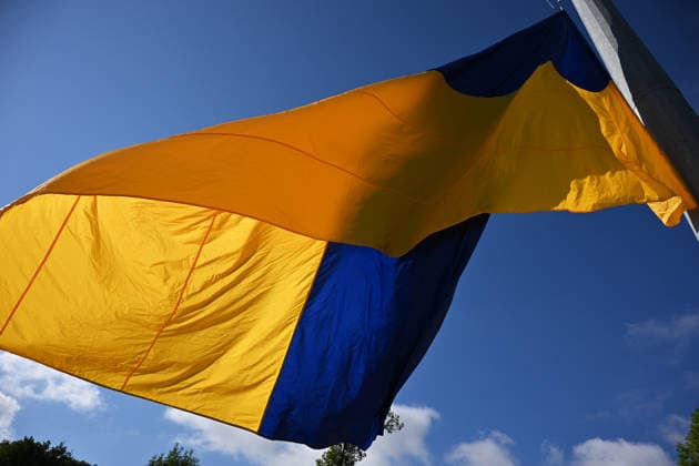 National Flag Day of Ukraine in Lviv LVIV, UKRAINE - AUGUST 23: Celebration of the National Flag Day of Ukraine during the Russian-Ukrainian War in Lviv, Ukraine on August 23, 2026. Due to the war, only the ceremonial raising of the Ukrainian flag on the highest flagpole in the city with the participation of soldiers from various branches of the armed forces took place. People also honored the fallen with a minute of silence, sang the Ukrainian anthem, and a military orchestra played several patriotic and folk songs. Michael Sorrow Anadolu Lviv Ukraine. Editorial use only. Please get in touch for any other usage.  Copyright: x2026xAnadoluxMichaelxSorrowx