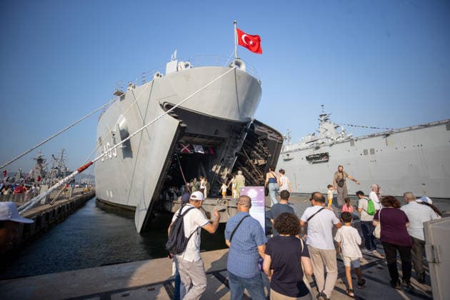 TEKNOFEST Blue Homeland KOCAELI, TURKIYE - AUGUST 23: Visitors board TCG Sancaktar (L-403) via its stern ramp during TEKNOFEST Blue Homeland at the Golcuk Naval Shipyard Command in Kocaeli, Turkiye, on August 23, 2026. TCG Sancaktar carries out military missions including amphibious operations and mine-laying, and can also serve as a hospital, logistics support and evacuation ship in disaster zones. The event, organized under the leadership of the Turkish Ministry of National Defense and the Turkish Technology Team Foundation (T3 Foundation), with Anadolu serving as its Global Communication Partner, continues on its final day. Ibrahim Yozoglu Anadolu Kocaeli Turkey. Editorial use only. Please get in touch for any other usage.  Copyright: x2026xAnadoluxIbrahimxYozoglux