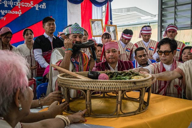 Traditional Karen Wrist-Tying Ceremony held in Bangkok, Thailand BANGKOK, THAILAND - AUGUST 23: A Karen man blows a buffalo horn during a traditional wrist-tying ceremony at Wat Dok Mai in Bangkok, Thailand, on August 23, 2026. The Karen Wrist Tying Ceremony, traditionally held around the full moon of August, involves tying white threads around participants wrists as part of a custom associated with well-being, cultural continuity and community unity. Wissarut Weerasopon Anadolu Banghok Thailand. Editorial use only. Please get in touch for any other usage.  Copyright: x2026xAnadoluxWissarutxWeerasoponx