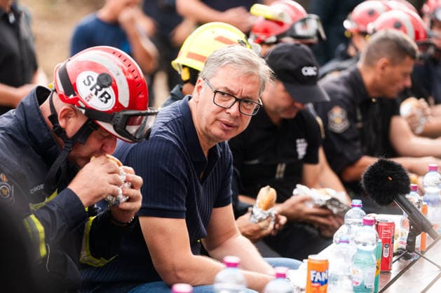 August 23, 2026, Umarak, Vojvodina, Serbia: 2026823, A umarak, Serbia -Serbian President VUCIC ALEKSANDAR visits the Deliblato Sands (Deliblatska Pescara) Special Nature Reserve to inspect the areas devastated by a massive wildfire. The president held an outdoor briefing and shared a meal with firefighters, military personnel, and rescue teams to discuss the ongoing response to the natural disaster. Umarak Serbia - ZUMAd223 20260823_zip_d223_013 Copyright: xMarkoxDimicx