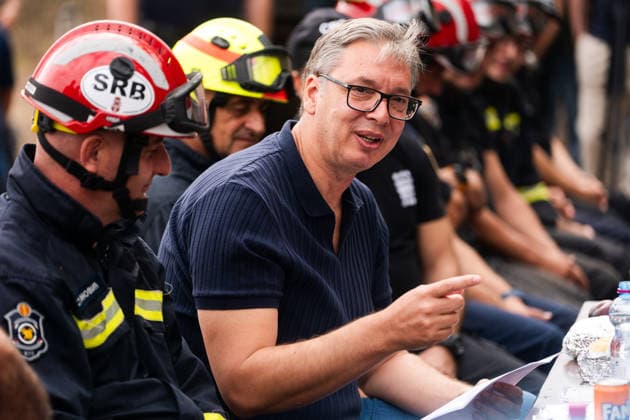 August 23, 2026, Umarak, Vojvodina, Serbia: 2026823, A umarak, Serbia -Serbian President VUCIC ALEKSANDAR visits the Deliblato Sands (Deliblatska Pescara) Special Nature Reserve to inspect the areas devastated by a massive wildfire. The president held an outdoor briefing and shared a meal with firefighters, military personnel, and rescue teams to discuss the ongoing response to the natural disaster. Umarak Serbia - ZUMAd223 20260823_zip_d223_018 Copyright: xMarkoxDimicx