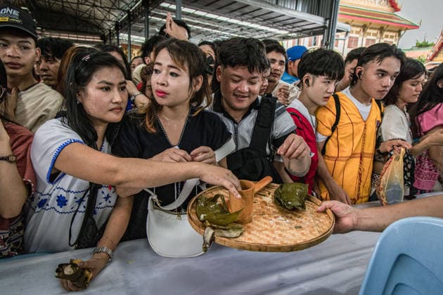 Traditional Karen Wrist-Tying Ceremony held in Bangkok, Thailand BANGKOK, THAILAND - AUGUST 23: Members of the Karen community attend a traditional wrist-tying ceremony at Wat Dok Mai in Bangkok, Thailand, on August 23, 2026. The ceremony, which includes tying white cotton threads around participants wrists, is a tradition passed down through generations and is associated with well-being, strength and the preservation of Karen culture. Wissarut Weerasopon Anadolu Banghok Thailand. Editorial use only. Please get in touch for any other usage.  Copyright: x2026xAnadoluxWissarutxWeerasoponx
