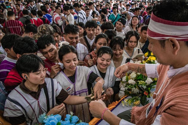 Traditional Karen Wrist-Tying Ceremony held in Bangkok, Thailand BANGKOK, THAILAND - AUGUST 23: Members of the Karen community attend a traditional wrist-tying ceremony at Wat Dok Mai in Bangkok, Thailand, on August 23, 2026. The ceremony, which includes tying white cotton threads around participants wrists, is a tradition passed down through generations and is associated with well-being, strength and the preservation of Karen culture. Wissarut Weerasopon Anadolu Banghok Thailand. Editorial use only. Please get in touch for any other usage.  Copyright: x2026xAnadoluxWissarutxWeerasoponx