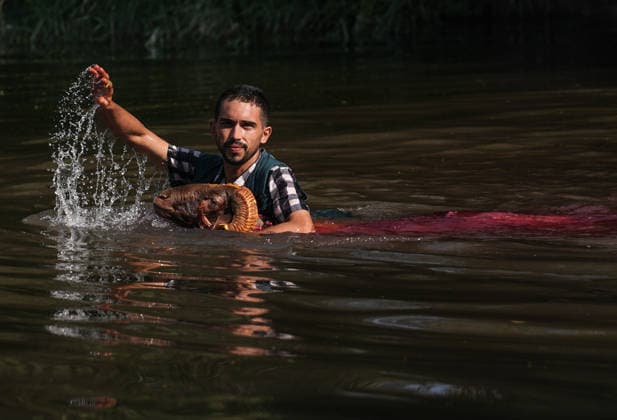 Shepherds and adorned sheep compete in Turkiye s 853-year-old river crossing contest DENIZLI, TURKIYE - AUGUST 23: Shepherds guide their sheep to cross the Buyuk Menderes River during the 853-year-old traditional Sheep Crossing Water Contest in the Cal district of Denizli, Turkiye on August 23, 2026. This year s historic event saw 47 shepherds with 63 flocks participating from surrounding districts. Waiting their turn since sunrise, the shepherds led their painted and decorated leader sheep ( elci ) to guide the rest of the flock across the river. Mahmut Serdar Alakus Anadolu Denizli Turkey. Editorial use only. Please get in touch for any other usage.  Copyright: x2026xAnadoluxMahmutxSerdarxAlakusx