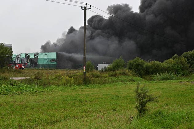Fire breaks out at logistics center in St. Petersburg ST. PETERSBURG, RUSSIA - AUGUST 23: Firefighters respond to the area where a fire broke out at a logistics center as thick black smoke rises in St. Petersburg, Russia, on August 23, 2026. Boris Smirnov Anadolu Saint Petersburg Russia. Editorial use only. Please get in touch for any other usage.  Copyright: x2026xAnadoluxBorisxSmirnovx