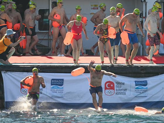 (260823) -- ISTANBUL, Aug. 23, 2026 -- Swimmers start during the 38th Bosphorus Cross-Continental Swimming Race in Istanbul, T¨¹rkiye, Aug. 23, 2026. ) (SP)T?RKIYE-ISTANBUL-BOSPHORUS CROSS-CONTINENTAL SWIMMING RACE LiuxLei 