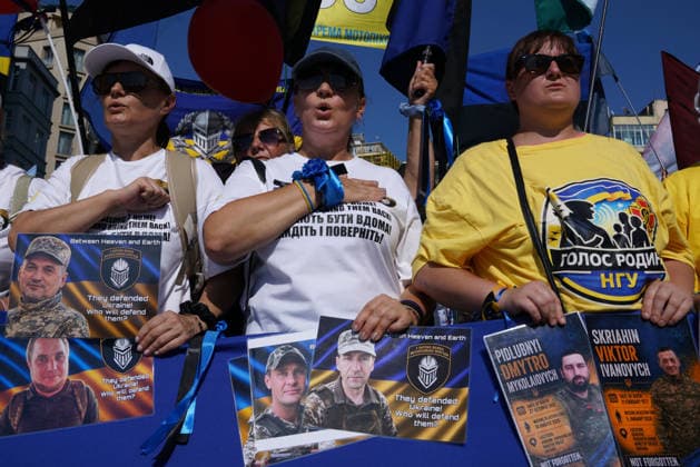 August 23, 2026, Beyoglu, Istanbul, Turkey: Ukrainians living in Turkey hold portraits of missing soldiers and flags as they gather to mark their National Flag Day, in Istanbul, Turkey, August 23, 2026. Beyoglu Turkey - ZUMAu194 20260823_zip_u194_003 Copyright: xTolgaxUluturkx