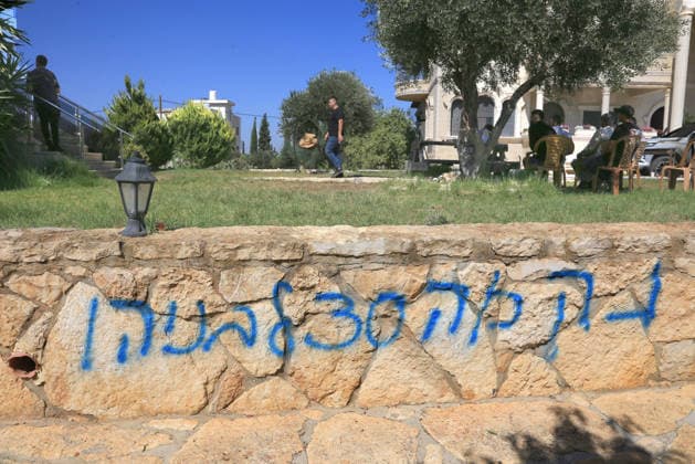 August 23, 2026, Nablus, West Bank, Palestine: Graffiti left by Israeli settlers is seen around the home that was set on fire following an attack by a group of Jewish settlers in the village of Osarin, south of Nablus in the West Bank. The settlers attacked homes, torched a Palestinian car in the early morning hours, and wrote Hebrew slogans on the walls calling for revenge against Palestinians. Nablus Palestine  - ZUMAs197 20260823_aaa_s197_036 Copyright: xNasserxishatyehx
