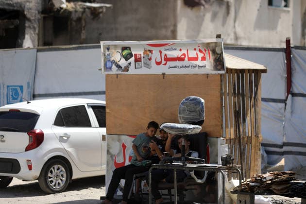Displaced Palestinians Continue Daily Life Near Ruined Homes in Gaza City Displaced Palestinians try to continue their daily life near their destroyed homes in the Zeitoun neighborhood of Gaza City, on August 23, 2026. Residents are living in tents and temporary shelters beside the rubble of buildings destroyed during the war. Photo by Bilal Osama apaimages Gaza city Gaza Strip Palestinian Territory 230826_Gaza_BO_01(14) Copyright: xapaimagesxBilalxOsamax xapaimagesx