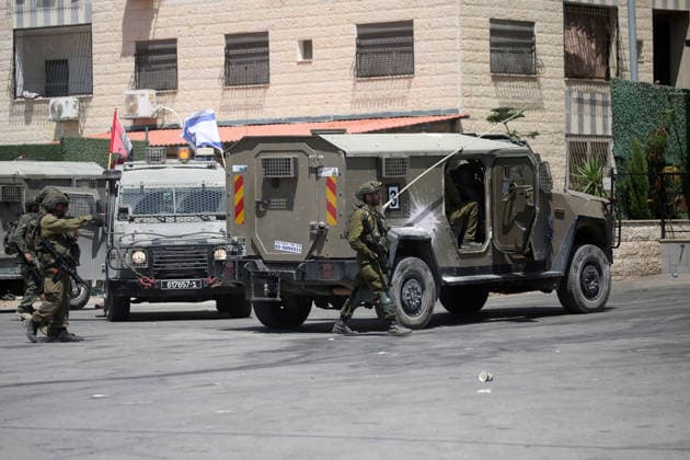 Israeli Soldiers Raid Askar Refugee Camp in Nablus Israeli soldiers deploy during a raid on Askar refugee camp, east of Nablus, in the West Bank, on August 23, 2026, as forces enter Palestinian shops and homes. A Palestinian medical source said a 15-year-old boy was killed during the raid. Photo by Mohammed Nasser apaimages Nablus West Bank Palestinian Territory 230826_Nablus_MN_01(4) Copyright: xapaimagesxMohammedxNasserx xapaimagesx