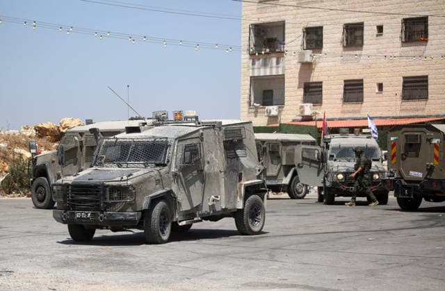 Israeli Soldiers Raid Askar Refugee Camp in Nablus Israeli soldiers deploy during a raid on Askar refugee camp, east of Nablus, in the West Bank, on August 23, 2026, as forces enter Palestinian shops and homes. A Palestinian medical source said a 15-year-old boy was killed during the raid. Photo by Mohammed Nasser apaimages Nablus West Bank Palestinian Territory 230826_Nablus_MN_01(6) Copyright: xapaimagesxMohammedxNasserx xapaimagesx