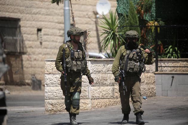 Israeli Soldiers Raid Askar Refugee Camp in Nablus Israeli soldiers deploy during a raid on Askar refugee camp, east of Nablus, in the West Bank, on August 23, 2026, as forces enter Palestinian shops and homes. A Palestinian medical source said a 15-year-old boy was killed during the raid. Photo by Mohammed Nasser apaimages Nablus West Bank Palestinian Territory 230826_Nablus_MN_01(7) Copyright: xapaimagesxMohammedxNasserx xapaimagesx