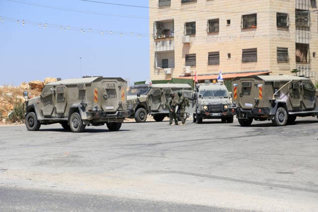 Israeli Soldiers Raid Askar Refugee Camp in Nablus Israeli soldiers deploy during a raid on Askar refugee camp, east of Nablus, in the West Bank, on August 23, 2026, as forces enter Palestinian shops and homes. A Palestinian medical source said a 15-year-old boy was killed during the raid. Photo by Mohammed Nasser apaimages Nablus West Bank Palestinian Territory 230826_Nablus_MN_01(8) Copyright: xapaimagesxMohammedxNasserx xapaimagesx