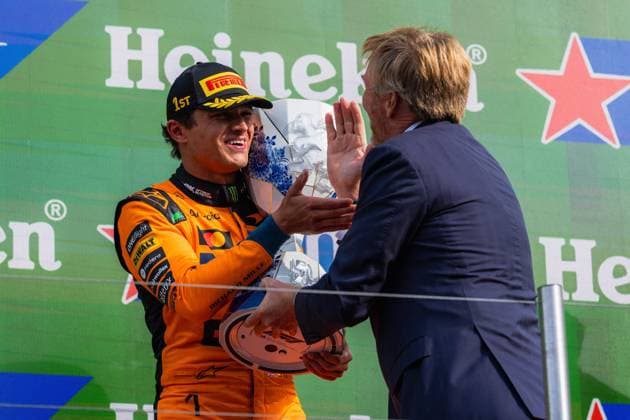 F1 Dutch Grand Prix - King Willem-Alexander Celebrates Lando Norris McLaren driver Lando Norris receives the trophy from King Willem-Alexander of the Netherlands after winning the Formula 1 Heineken Dutch Grand Prix 2026 at Circuit Zandvoort in Zandvoort, Netherlands on August 23, 2026. Photo by Kay Int Veen NL Beeld Bruno Press ABACAPRESS.COM  Copyright: xBrunoxPress ABACAx