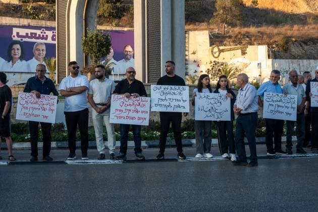 Arab Israelis protest Gaza war and violence in Umm al-Fahm UMM AL-FAHM, ISRAEL AUGUST 23, 2026: Demonstrators take part in a protest organized by the Umm al-Fahm Popular Committee in Umm al-Fahm, northern Israel, on August 23, 2026. Participants protested against Israel™s military operations in Gaza and policies in the occupied West Bank, while also denouncing what they described as government neglect of Arab communities in Israel and the impact of organized crime. umm ai fahm Israel Copyright: x xjessxflomx xJNAxPressx