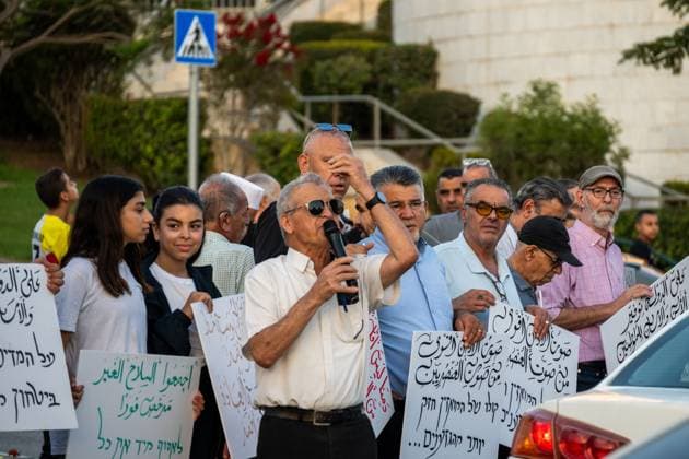 Arab Israelis protest Gaza war and violence in Umm al-Fahm UMM AL-FAHM, ISRAEL AUGUST 23, 2026: Demonstrators take part in a protest organized by the Umm al-Fahm Popular Committee in Umm al-Fahm, northern Israel, on August 23, 2026. Participants protested against Israel™s military operations in Gaza and policies in the occupied West Bank, while also denouncing what they described as government neglect of Arab communities in Israel and the impact of organized crime. umm ai fahm Israel Copyright: x xjessxflomx xJNAxPressx