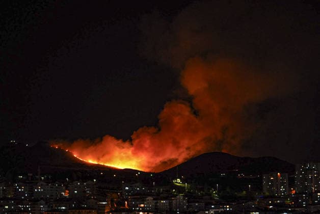 Firefighters respond to fire in wooded area in Ankara ANKARA, TURKIYE - AUGUST 23: Smoke rises from a wooded area in the Mamak district of Ankara, Turkiye on August 23, 2026, as firefighters work to extinguish the wide-scale fire using two fire trucks and three water tankers. Metin Aktas Anadolu Ankara Turkey. Editorial use only. Please get in touch for any other usage.  Copyright: x2026xAnadoluxMetinxAktasx