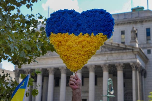 August 23, 2026, New York, New York, USA: Heart shape Ukraine Flag at Annual Ukrainian Independence March celebrating freedom from foreign domination. A large crowd .marched from Foley Square down Broadway to Bowling Green in Lower Manhattan commemorating .Ukraine freedom from Soviet Union oppression on Aujust 24. Carrying the blue and yellow flag of Ukraine as well as the US flag they carried the message of fighting back against Russia trying to continue their colonial empire. Ukraine is standing strong..Standing for democracy not tyranny. New York USA  - ZUMAh156 20260823_znp_h156_006 Copyright: xMiloxHessx