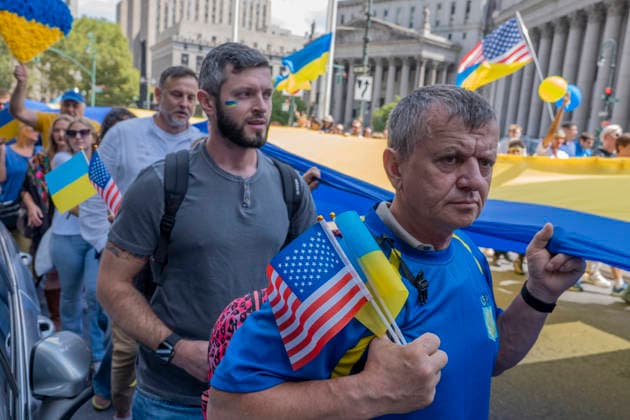 August 23, 2026, New York, New York, USA: Showing the flag at the Annual Ukrainian Independence March celebrating freedom from foreign domination. A large crowd .marched from Foley Square down Broadway to Bowling Green in Lower Manhattan commemorating .Ukraine freedom from Soviet Union oppression on Aujust 24. Carrying the blue and yellow flag of Ukraine as well as the US flag they carried the message of fighting back against Russia trying to continue their colonial empire. Ukraine is standing strong..Standing for democracy not tyranny. New York USA  - ZUMAh156 20260823_znp_h156_014 Copyright: xMiloxHessx