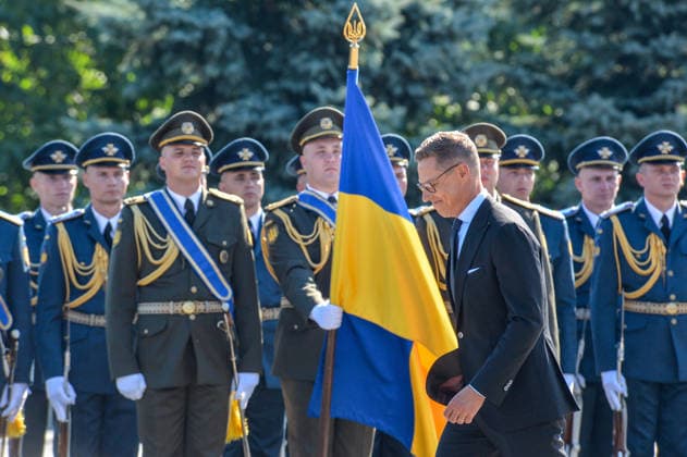 President of Finland Alexander Stubb walks past honour guards during the ceremony to raise the State Flag at the National Museum of the History of Ukraine in the Second World War Memorial Complex on National Flag Day, Kyiv, Ukraine, August 23, 2026. (Photo by Yevhen Kotenko Ukrinform) Raising of State Flag of Ukraine in Kyiv  Copyright: xYevhenxKotenkox