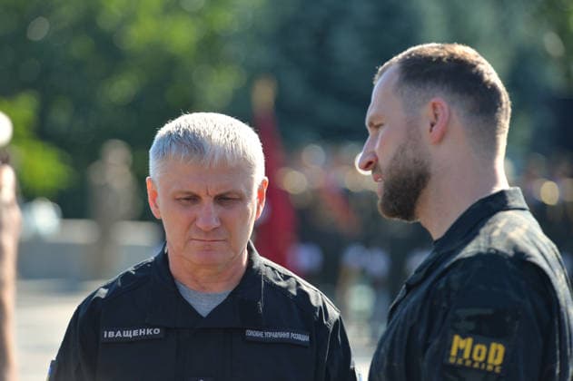 Chief of the Defence Intelligence of Ukraine Oleh Ivashchenko (L) and Minister of Defence of Ukraine Yevhenii Khmara attend the State Flag raising ceremony at the National Museum of the History of Ukraine in the Second World War Memorial Complex on National Flag Day, Kyiv, Ukraine, August 23, 2026. (Photo by Yevhen Kotenko Ukrinform) Raising of State Flag of Ukraine in Kyiv  Copyright: xYevhenxKotenkox