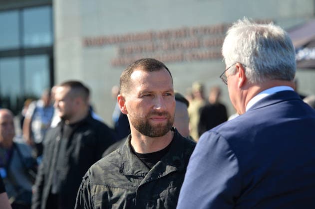 Minister of Defence of Ukraine Yevhenii Khmara (L) talks with Minister of Foreign Affairs of Ukraine Andrii Sybiha during the State Flag raising ceremony at the National Museum of the History of Ukraine in the Second World War Memorial Complex on National Flag Day, Kyiv, Ukraine, August 23, 2026. (Photo by Yevhen Kotenko Ukrinform) Raising of State Flag of Ukraine in Kyiv  Copyright: xYevhenxKotenkox