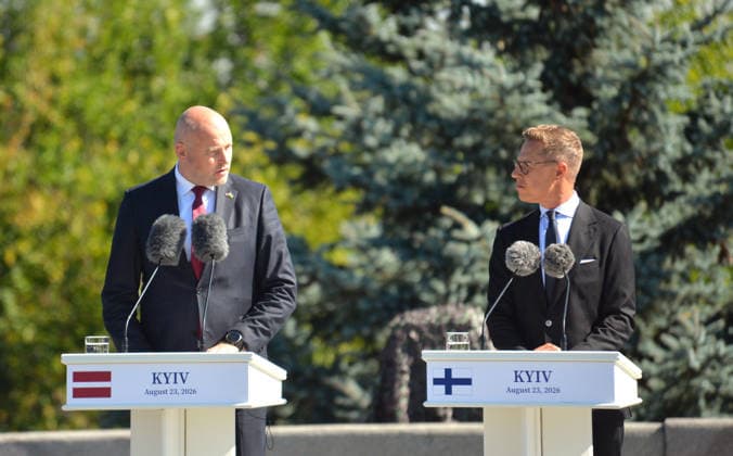 Prime Minister of Latvia Andris Kulbergs (L) and President of Finland Alexander Stubb attend the State Flag raising ceremony at the National Museum of the History of Ukraine in the Second World War Memorial Complex on National Flag Day, Kyiv, Ukraine, August 23, 2026. (Photo by Yevhen Kotenko Ukrinform) Raising of State Flag of Ukraine in Kyiv  Copyright: xYevhenxKotenkox