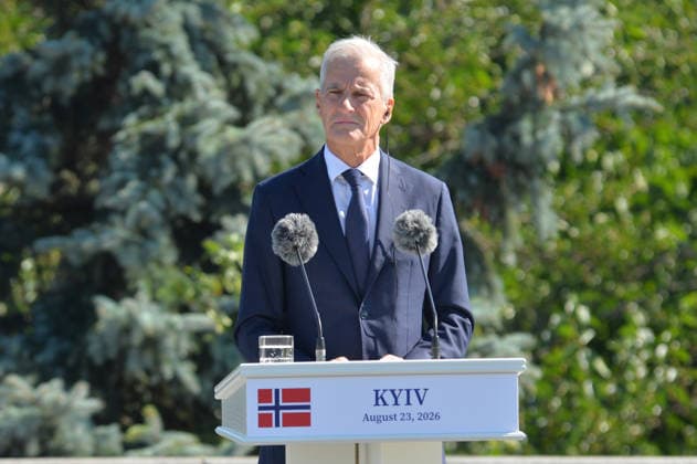 Prime Minister of Norway Jonas Gahr Store participates in the State Flag raising ceremony at the National Museum of the History of Ukraine in the Second World War Memorial Complex on National Flag Day, Kyiv, Ukraine, August 23, 2026. (Photo by Yevhen Kotenko Ukrinform) Raising of State Flag of Ukraine in Kyiv  Copyright: xYevhenxKotenkox
