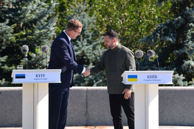 President of Ukraine Volodymyr Zelenskyy (R) shakes hands with Prime Minister of Estonia Kristen Michal during the ceremony to raise the State Flag at the National Museum of the History of Ukraine in the Second World War Memorial Complex on National Flag Day, Kyiv, Ukraine, August 23, 2026. (Photo by Yevhen Kotenko Ukrinform) Raising of State Flag of Ukraine in Kyiv  Copyright: xYevhenxKotenkox