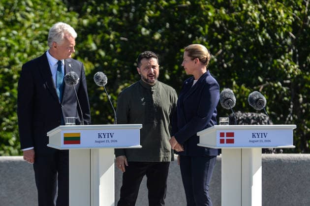 President of Lithuania Gitanas Nauseda, President of Ukraine Volodymyr Zelenskyy and Prime Minister of Denmark Mette Frederiksen (L to R) talk during the ceremony to raise the State Flag at the National Museum of the History of Ukraine in the Second World War Memorial Complex on National Flag Day, Kyiv, Ukraine, August 23, 2026. (Photo by Yevhen Kotenko Ukrinform) Raising of State Flag of Ukraine in Kyiv  Copyright: xYevhenxKotenkox