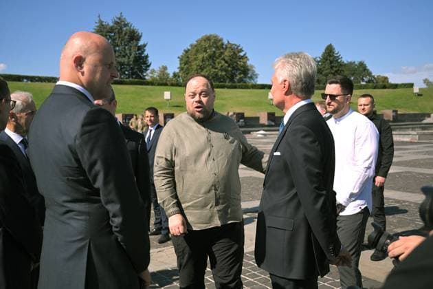 Prime Minister of Latvia Andris Kulbergs, Speaker of the Ukrainian Parliament Ruslan Stefanchuk and Prime Minister of Norway Jonas Gahr Store (L to R) talk during the ceremony to raise the State Flag at the National Museum of the History of Ukraine in the Second World War Memorial Complex on National Flag Day, Kyiv, Ukraine, August 23, 2026. (Photo by Yevhen Kotenko Ukrinform) Raising of State Flag of Ukraine in Kyiv  Copyright: xYevhenxKotenkox