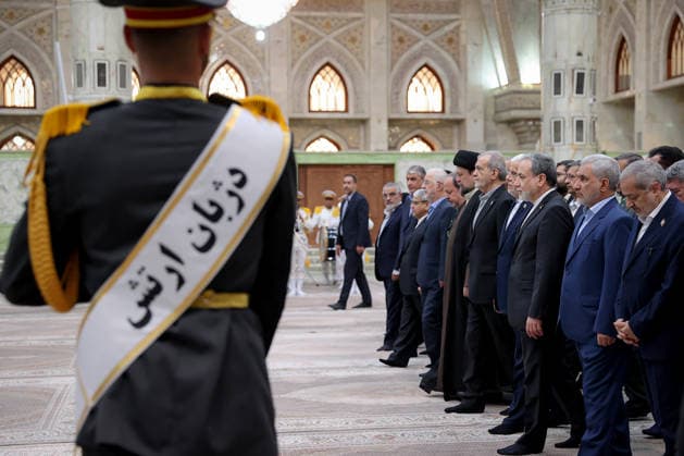 President Masoud Pezeshkian (5-R) attends an event to mark the first day of the Government Week at the mausoleum of Ayatollah Ruhollah Khomeini, the founder of the Islamic Republic of Iran, in Tehran, Iran on August 23, 2026. Iranian President Masoud Pezeshkian declared that no power will be able to force the Iranian people into surrender. He dismissed claims that sanctions would turn Iran into another Venezuela, saying that has not happened. He stressed the need to begin conserving gasoline consumption through government measures, including a plan to reduce the number and fuel use of government vehicles.  IRN2026082305 IranianxPresidency