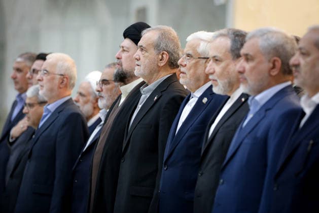 President Masoud Pezeshkian (C) attends an event to mark the first day of the Government Week at the mausoleum of Ayatollah Ruhollah Khomeini, the founder of the Islamic Republic of Iran, in Tehran, Iran on August 23, 2026. Iranian President Masoud Pezeshkian declared that no power will be able to force the Iranian people into surrender. He dismissed claims that sanctions would turn Iran into another Venezuela, saying that has not happened. He stressed the need to begin conserving gasoline consumption through government measures, including a plan to reduce the number and fuel use of government vehicles.  IRN2026082308 IranianxPresidency