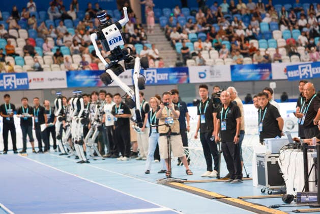 BEIJING, CHINA - AUGUST 23: A humanoid robot competes during the Long Jump event on day 2 of the 2nd World Humanoid Robot Games at National Speed Skating Oval on August 23, 2026 in Beijing, China.  Copyright: xChinaxNewsxServicex 111661706303