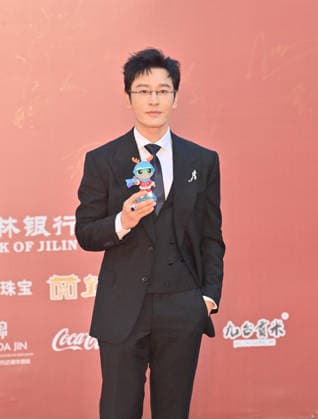 CHANGCHUN, CHINA - AUGUST 23: Actor Huang Xiaoming arrives at the red carpet for the opening of the 21st Changchun Film Festival on August 23, 2026 in Changchun, Jilin Province of China.  Copyright: xChinaxNewsxServicex 111661692731