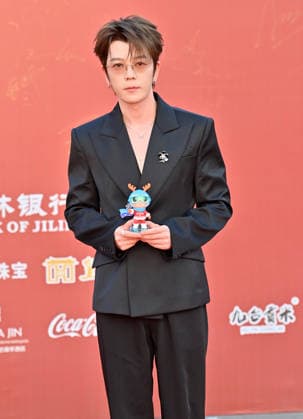 CHANGCHUN, CHINA - AUGUST 23: Actor singer Wang Yuexin arrives at the red carpet for the opening of the 21st Changchun Film Festival on August 23, 2026 in Changchun, Jilin Province of China.  Copyright: xChinaxNewsxServicex 111661693180
