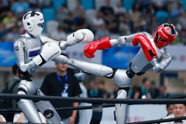 BEIJING, CHINA - AUGUST 23: Robots compete in the Kickboxing event on day 2 of the 2nd World Humanoid Robot Games at National Speed Skating Oval on August 23, 2026 in Beijing, China.  Copyright: xVCGx 111661664149