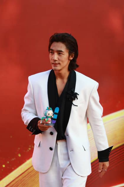 CHANGCHUN, CHINA - AUGUST 23: Actor Ci Sha arrives at the red carpet for the opening of the 21st Changchun Film Festival on August 23, 2026 in Changchun, Jilin Province of China.  Copyright: xVCGx 111661785227