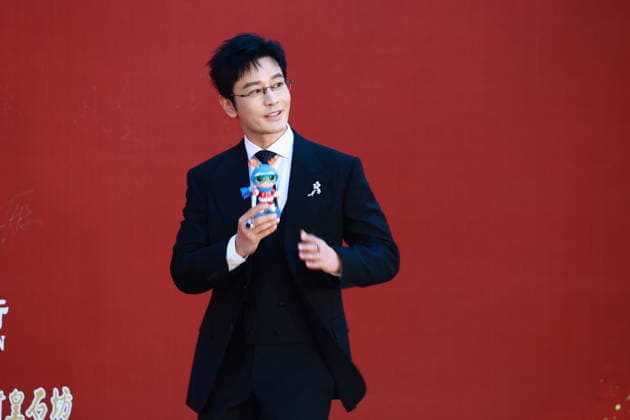 CHANGCHUN, CHINA - AUGUST 23: Actor Huang Xiaoming arrives at the red carpet for the opening of the 21st Changchun Film Festival on August 23, 2026 in Changchun, Jilin Province of China.  Copyright: xVCGx 111661785253