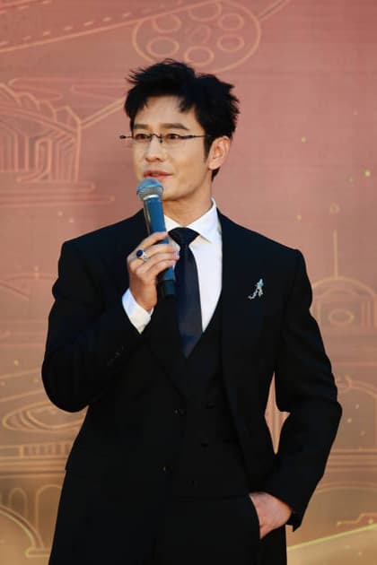 CHANGCHUN, CHINA - AUGUST 23: Actor Huang Xiaoming arrives at the red carpet for the opening of the 21st Changchun Film Festival on August 23, 2026 in Changchun, Jilin Province of China.  Copyright: xVCGx 111661785257
